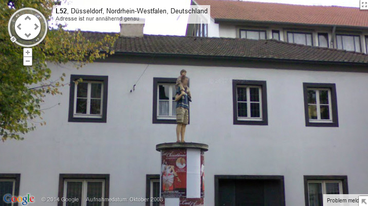 Vater und Sohn auf der Litfaßsäule